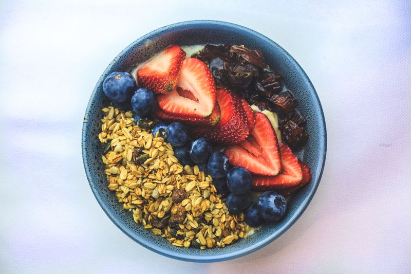 Tatte granola bowl with Greek yogurt and fresh berries